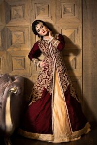 woman in red and gold dress