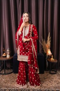 a woman in a red and white outfit